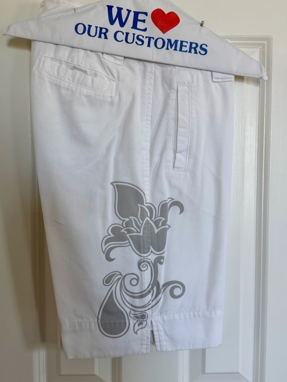 The North Face White Women's Flat-Front Shorts with Gray Floral Graphic Size 4
